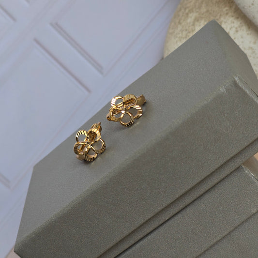 Huggie Flor martillada